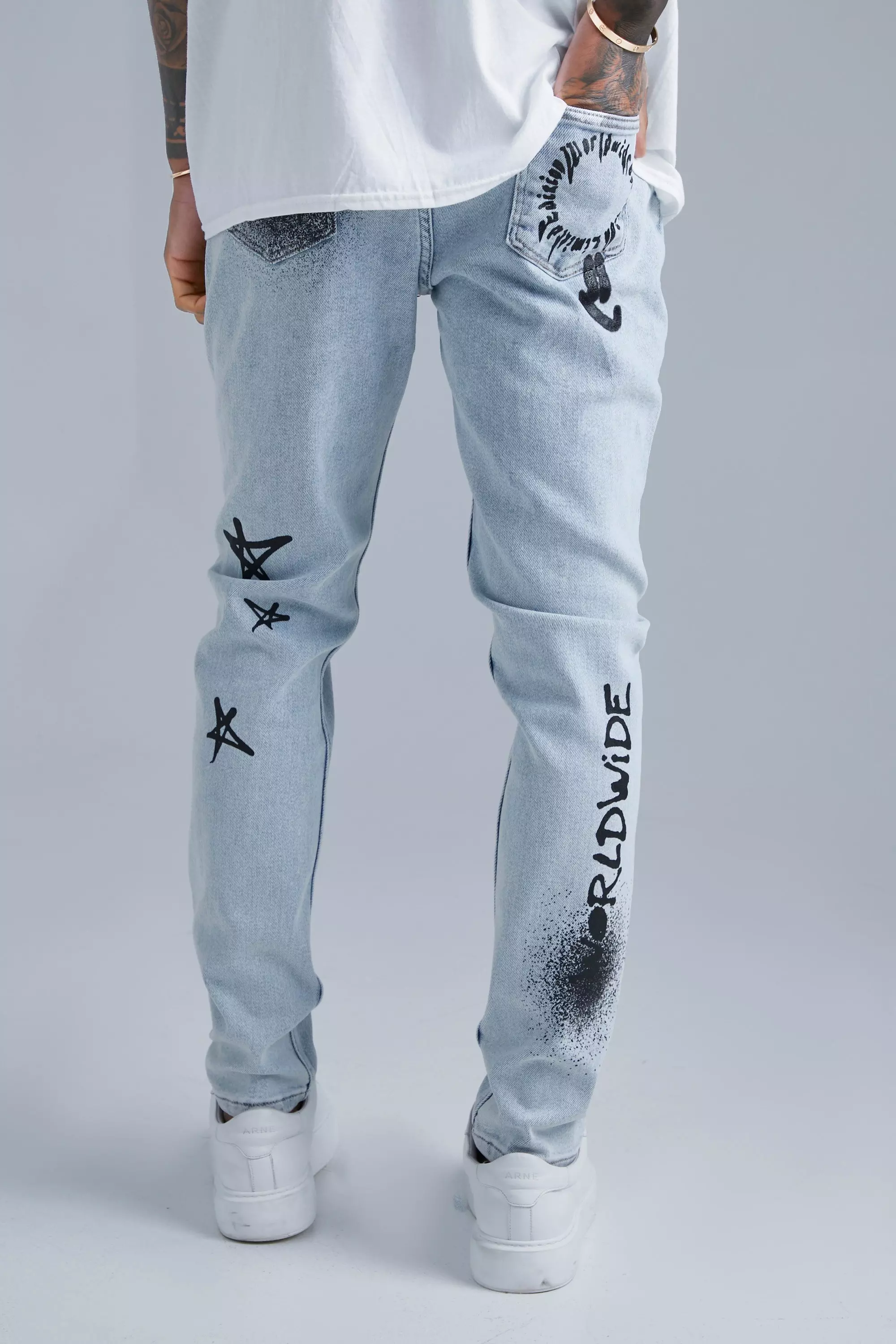 graffiti skinny jeans